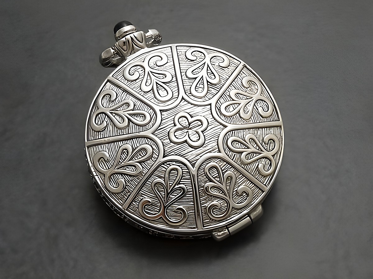 Nostalgisches Medaillon aus Onyx und Sterling Silber, verziert mit feinem, floralem Muster, ideal als Fotoanhänger, Hersteller Juwelier Harnisch, elegant und zeitlos. – Ansicht 2