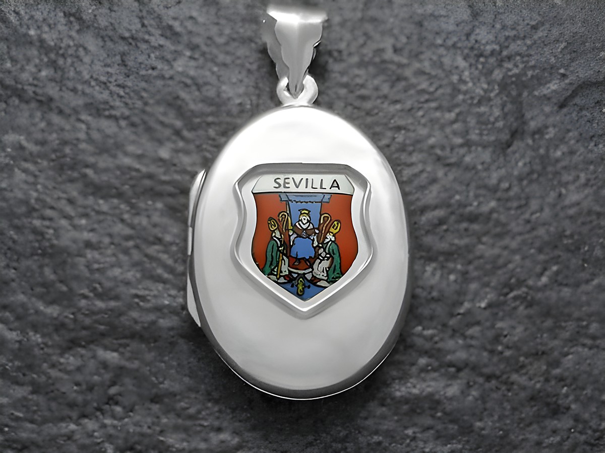 Silbernes Medaillon mit dem Stadtwappen von Sevilla, das in lebendigen Farben gestaltet ist und von Juwelier Harnisch gefertigt wurde, ideal für Sammler und Liebhaber.