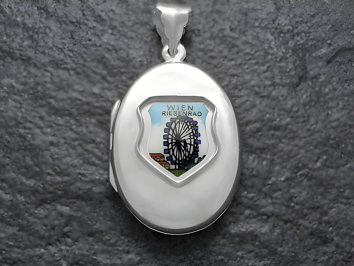 Silbernes Medaillon mit dem Wiener Riesenrad und dem österreichischen Wappen, hergestellt von Juwelier Harnisch, Europa Medaillons. Elegantes Design und detailreiche Darstellung.