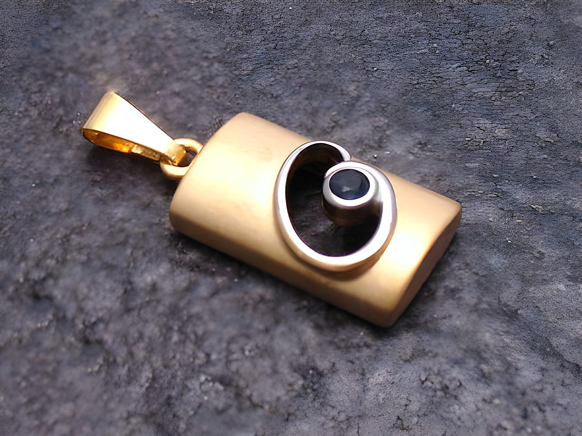 Gold Anhänger schick in bicolor Gold 585 mit einem runden Saphir, hergestellt von Juwelier Harnisch, elegant und modern gestaltet für stilvolle Akzente.