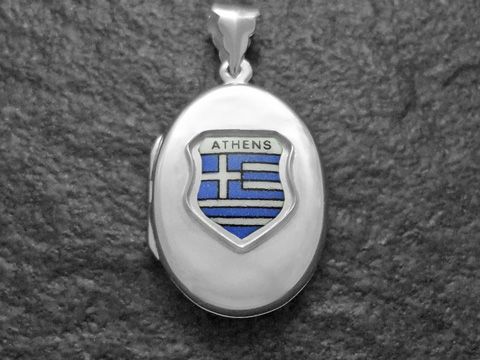 Silbermedaillon mit dem Wappen von Athen, das eine Darstellung der griechischen Flagge zeigt. Hersteller ist Juwelier Harnisch, geeignet für Sammler und als Schmuckstück.