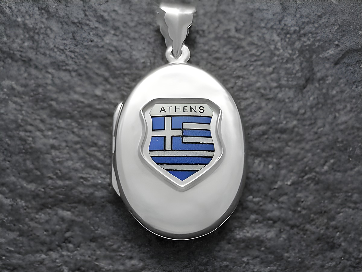 Silbermedaillon mit dem Wappen von Athen, das eine Darstellung der griechischen Flagge zeigt. Hersteller ist Juwelier Harnisch, geeignet für Sammler und als Schmuckstück.
